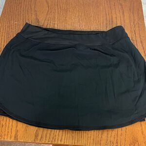 Rabbit Black Running Skort size XS pockets on side & Reflective zipper back